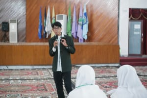 a person standing on a stage